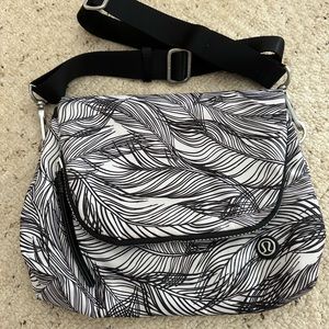Lululemon 5L festival purse, black & white, never used.